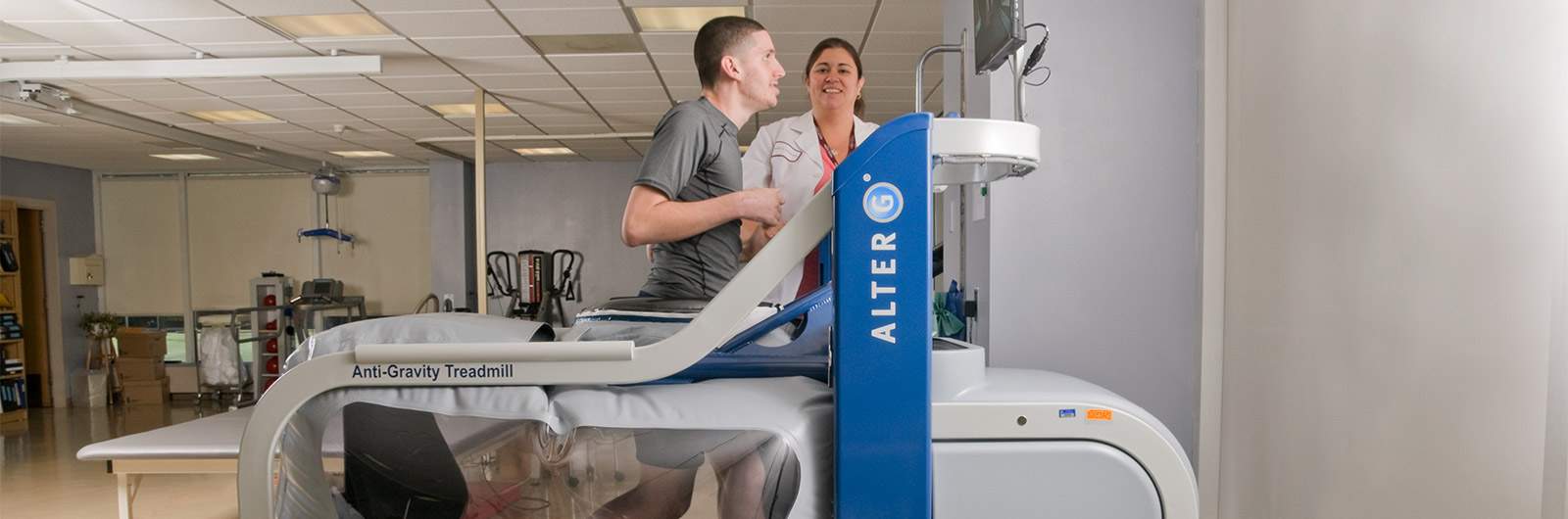 Patient and anti-gravity treadmill Patient using anti-gravity treadmill