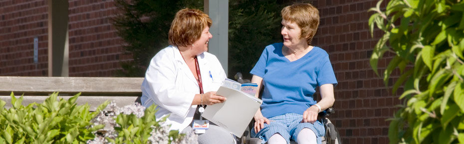Helen Hayes staff and patient in wheelchair outside