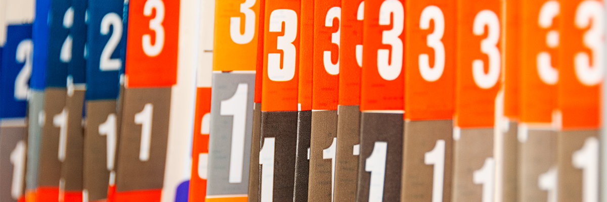 Photo of colored and numbered tabs of medical records